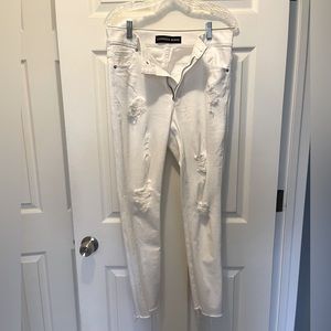 White distressed Express jeans.